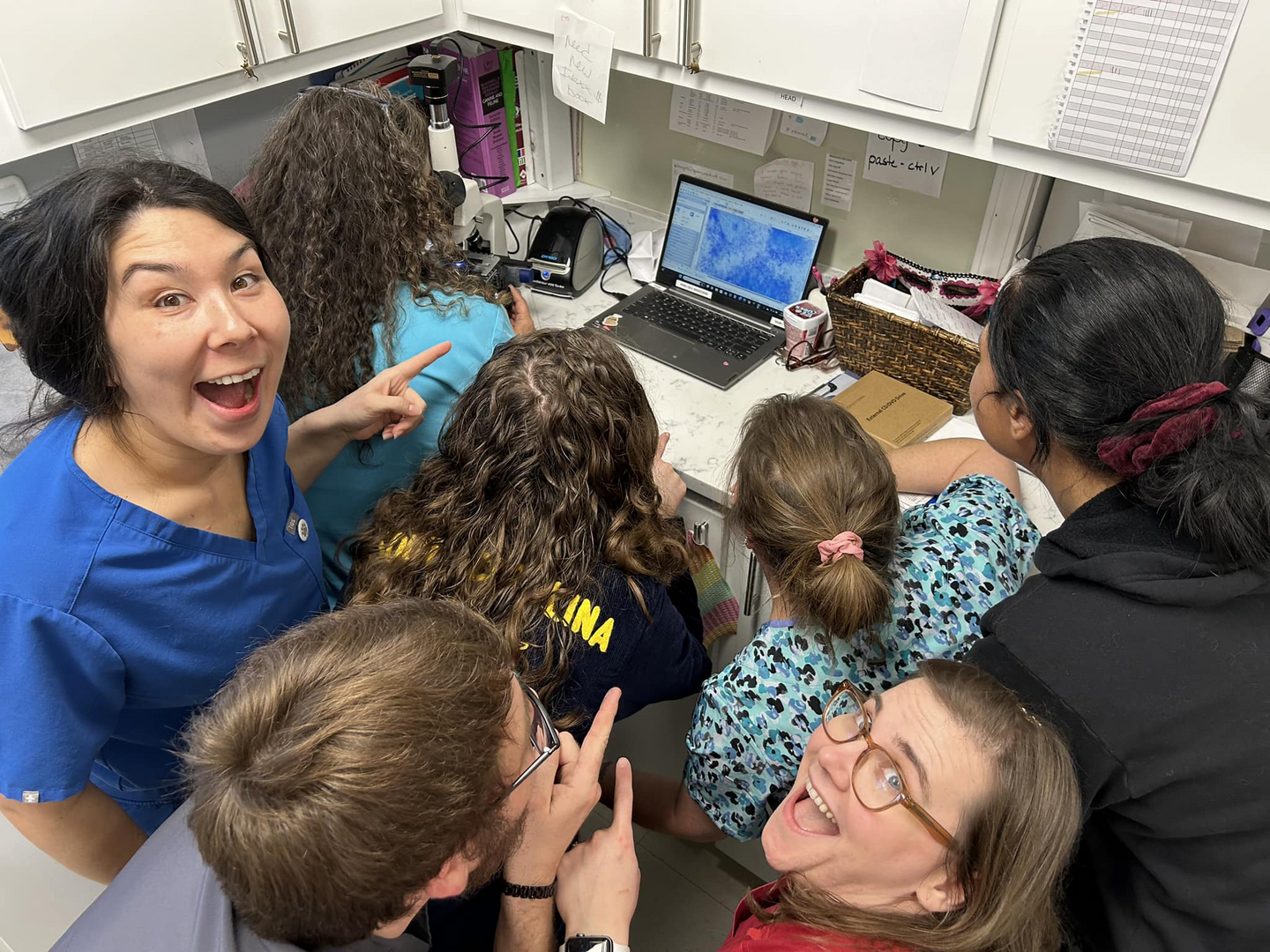 Spears Creek Veterinary Clinic team with patients